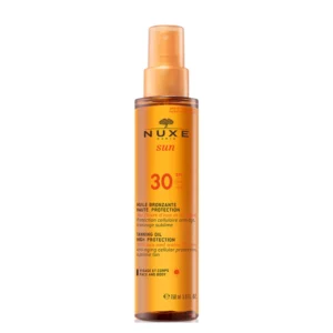 Achieve a luminous, golden tan while protecting your skin with Nuxe Sun Tanning Sun Oil SPF30. Specially crafted for sun-sensitive skin, this luxurious oil provides high sun protection, shielding you from UVA and UVB rays, and works to prevent premature photoaging. Ideal for face and body, it’s suited to those with intermediate to sun-resistant skin types, offering a patented filter complex to guard against both low to moderate and intense sun exposure.